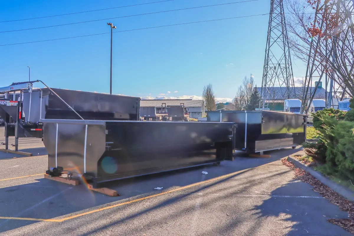 Roll-off dumpster ready for waste disposal at job site for Commercial Dumpster Rental in Batesville